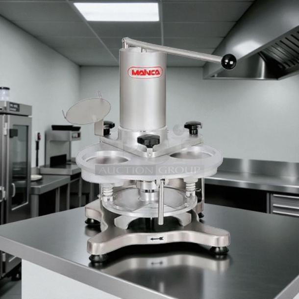 Mainca MH-120 manual hamburger patty press, in great condition, tested and working. Features stainless steel build and ergonomic handle.