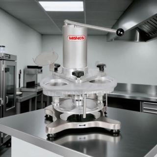 Mainca MH-120 manual hamburger patty press, in great condition, tested and working. Features stainless steel build and ergonomic handle.