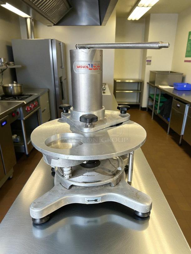 Mainca MH-120 Manual Hamburger Patty Press in great condition. Tested and working, with Mainca USA branding visible.
