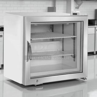 Like new Maxx Cold MXM1-2FHC countertop glass door merchandiser freezer with two shelves, ideal for display; excellent condition.