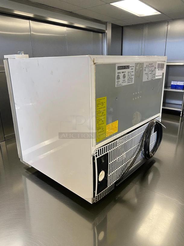 Maxx Cold MXM1-2FHC countertop glass door merchandiser freezer, like new condition, with visible labels and controls.