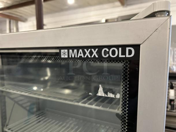 Maxx Cold MXM1-2FHC countertop glass door merchandiser freezer, like new condition, visible brand label.