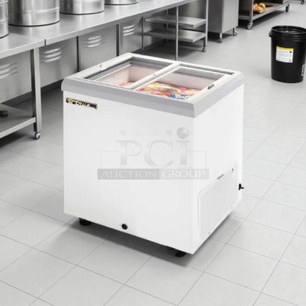 True THM-29FL chest freezer with flat sliding glass top, 6.3 cu.ft. capacity, white, tested working, 115 volts.