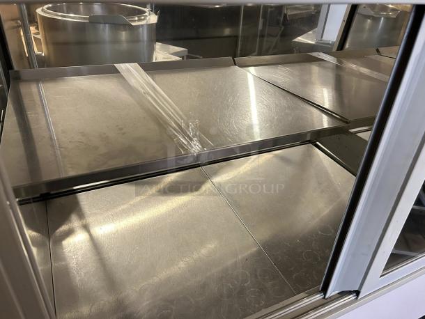 Schmidt EHD-4 refrigerated bakery display case in great condition. Stainless steel shelving, clear glass front, 115V, fully tested.