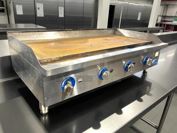 Globe GG48TG 48" gas griddle, excellent condition, thermostatic controls, 1" steel plate, tested and working.