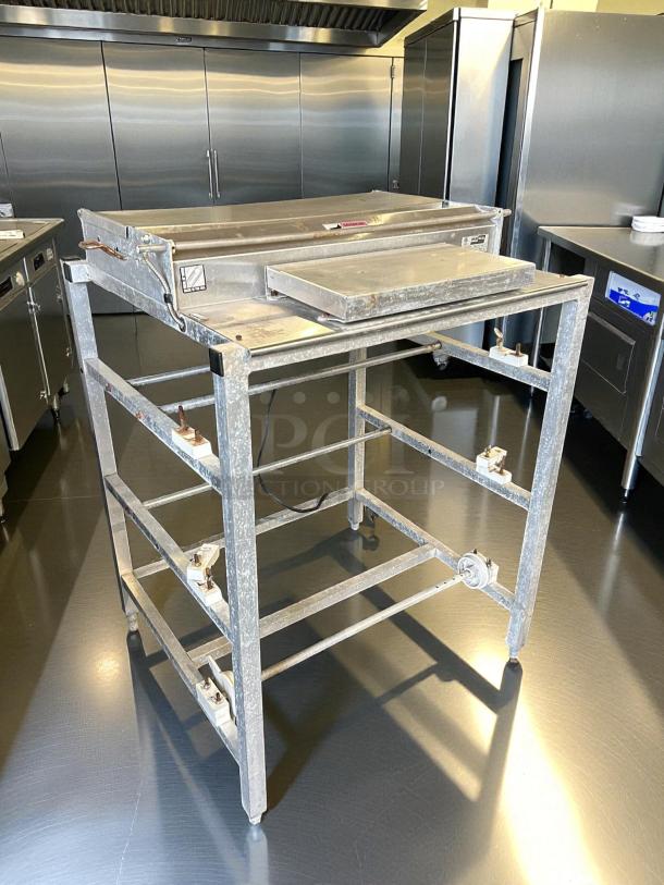 Heat Seal 104A wrapping machine, triple 20" roll, extra wide, 725W, 115V, stainless steel, great condition, tested working.