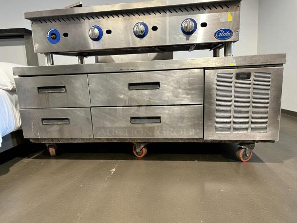 Delfield F2962CP 62 1/4" Chef Base with 4 drawers, stainless steel, tested and working, visible wear, on wheels.