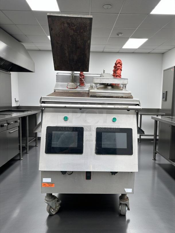 Garland Xpress XPG24 natural gas clamshell griddle, 24", 40,000 BTU, dual platens, easyTouch controls, excellent condition.