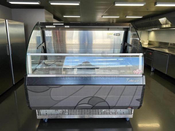 Turbo Air TOM-50LB-N 50" horizontal open air cooler with two levels, in good condition, tested and working, 115v.