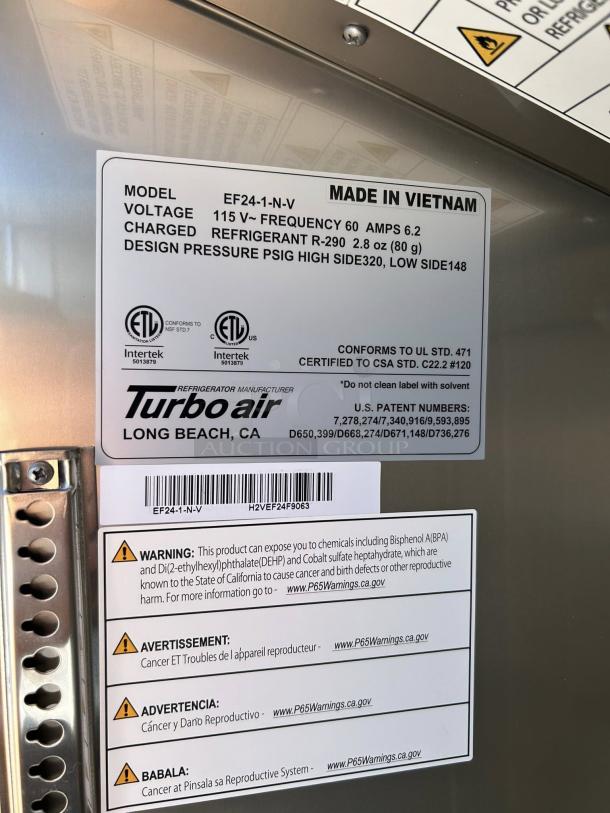 Turbo Air EF24-1-N-V 28" reach-in freezer label. Details model, voltage, refrigerant, and safety warnings. Like new condition.