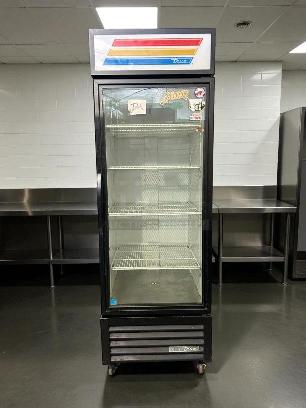True GDM-23-HC~TSL01 glass door merchandiser, excellent condition, black, right hinge, 27", tested, working.