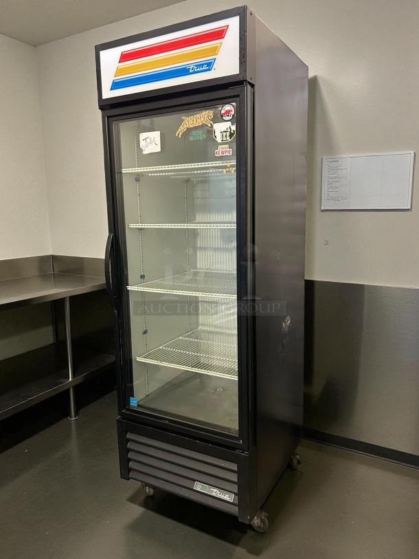 True GDM-23-HC~TSL01 27" glass door merchandiser, excellent condition, black, right hinge door, 115v, tested and working.