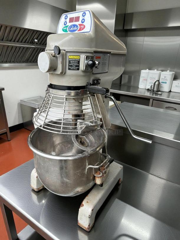 Globe SP20 20 qt planetary mixer, bench model, 1/2 hp, 115v, in great condition. Includes control panel and metal bowl.