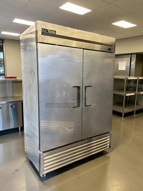 True T-49F-HC two-section reach-in freezer with left/right hinge solid doors, excellent condition, 115v, stainless steel.