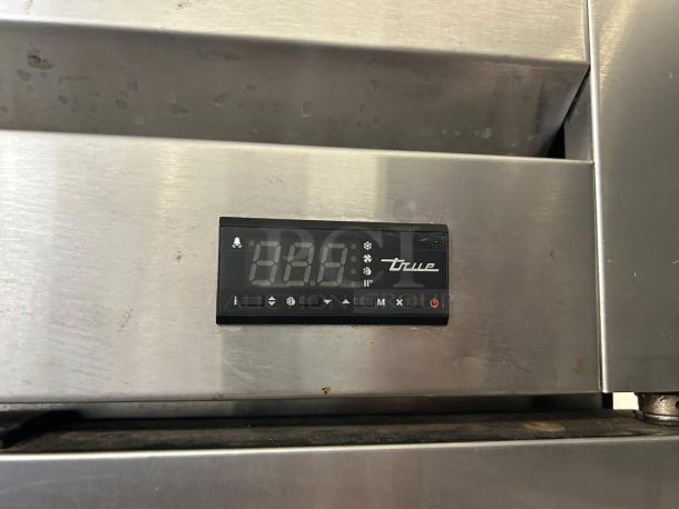 True T-49F-HC freezer control panel, digital display, stainless steel surface, excellent condition.