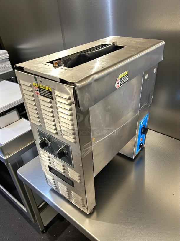 Antunes VCT-1000 Vertical Bun Toaster, excellent condition, 424 slices/hr, 1.5" opening, 208/240v, tested and working.