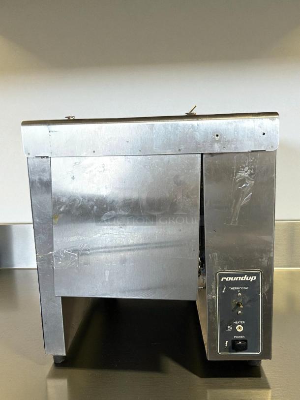 Antunes VCT-1000 vertical bun toaster in stainless steel, 480 slices/hr, 1 1/2" opening. Tested, working condition. Marked "roundup."