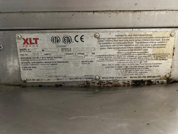 XLT Owens XLT3255 Conveyor Oven label showing model, serial number, 120 volts, 150,000 BTU rating, natural gas type.