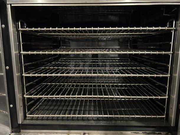 Montague Company 2EK12A electric convection oven, double-deck, full-size, four racks, stainless steel interior, excellent condition.