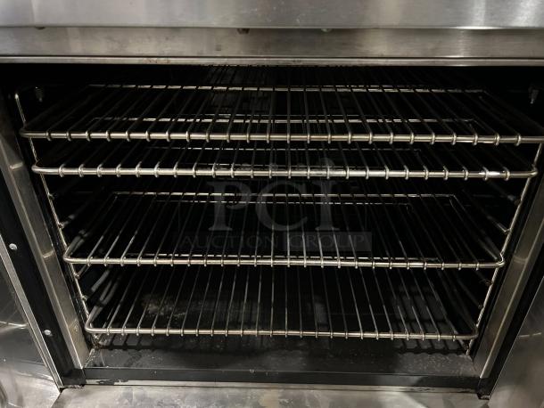 Montague Company 2EK12A electric convection oven, double-deck, full-size, shown with open racks, tested and working.