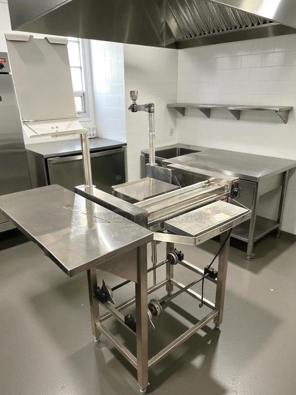 Hobart HWS-4-C floor model wrap station with hotplate, 2 film roll capacity, stainless steel, tested, 120v, excellent condition.