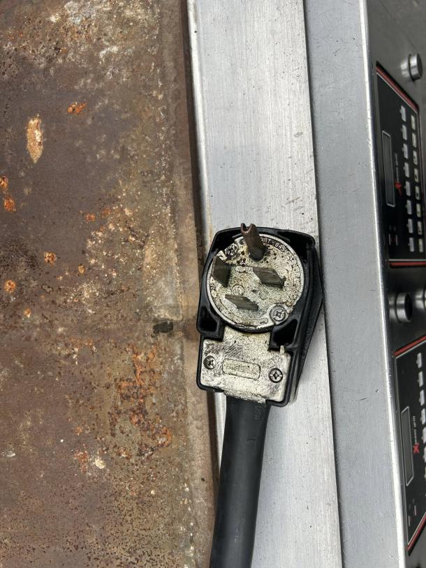 Garland Xpress XPG24 LP 24" clamshell griddle with touch controls, showing connector and controls panel. Good condition.