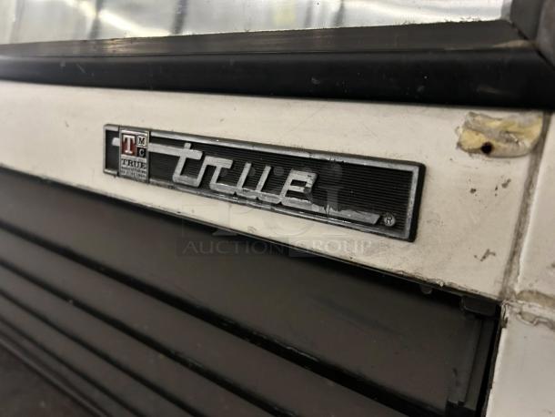 True TSID-72-3-L refrigerated deli display case, 72", low-height, excellent condition, visible True label.