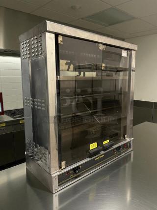 Robot Coupe electric countertop chicken rotisserie, 220v, 1ph, stainless steel, tested and working, front control panel visible.