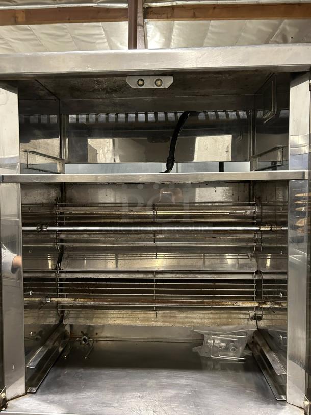Robot Coupe electric countertop chicken rotisserie, 220v, 1ph, stainless steel, tested and working, excellent condition.