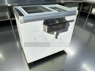 Kelvinator KCNF073WS commercial ice cream display freezer, 7 cu.ft capacity, tested, working, glass sliding lid, Dipwell attached.