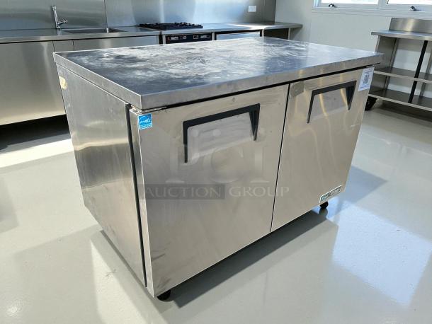 True TUC-48-HC undercounter refrigerator, like new, 48" wide, stainless steel with two doors, 115v, ideal condition.
