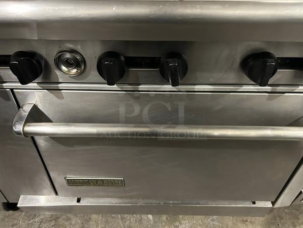 American Range AR-6, 36" natural gas 6-burner range with standard oven, in great condition. Visible logo plate.