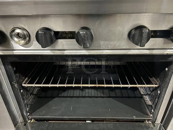 American Range AR-6, 36" natural gas 6-burner range with standard oven, tested and working, in great condition.