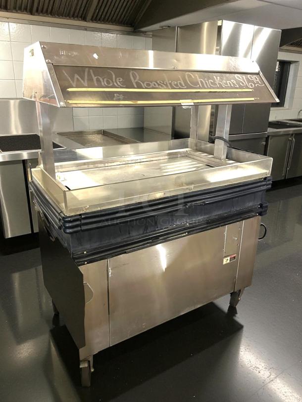 BKI MM-4 4ft mobile hot deli display in excellent condition, for rotisserie chicken. Tested, working, stainless steel, 120V.