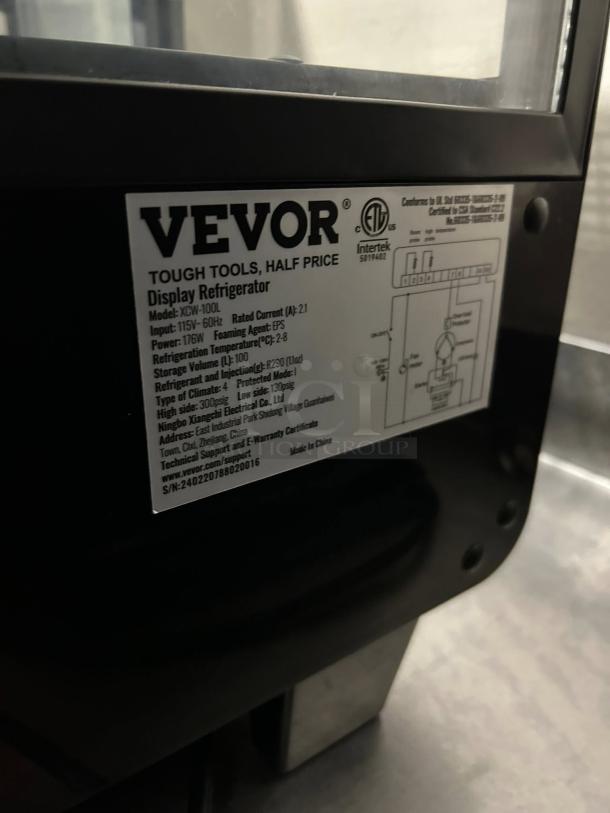 VEVOR XCW-100L display refrigerator label. Shows model, electrical specifications, and brand details in excellent condition.