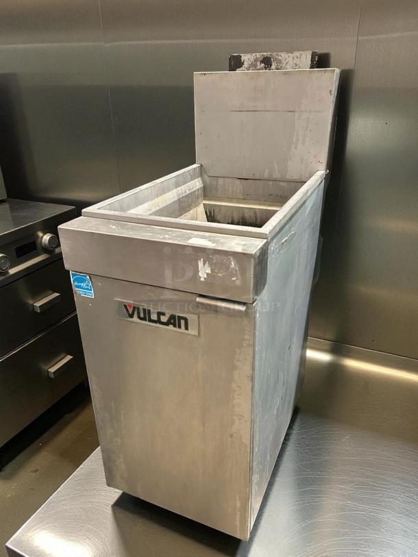 Vulcan LG300-NG natural gas floor fryer, excellent condition, 35-40 lb. capacity, tested and working, industrial kitchen setting.