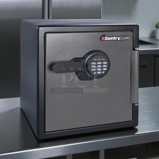Sentry® Safe Fire-Safe, 1.23 cu ft, digital keypad, great condition, tested and working, black finish, secure storage.