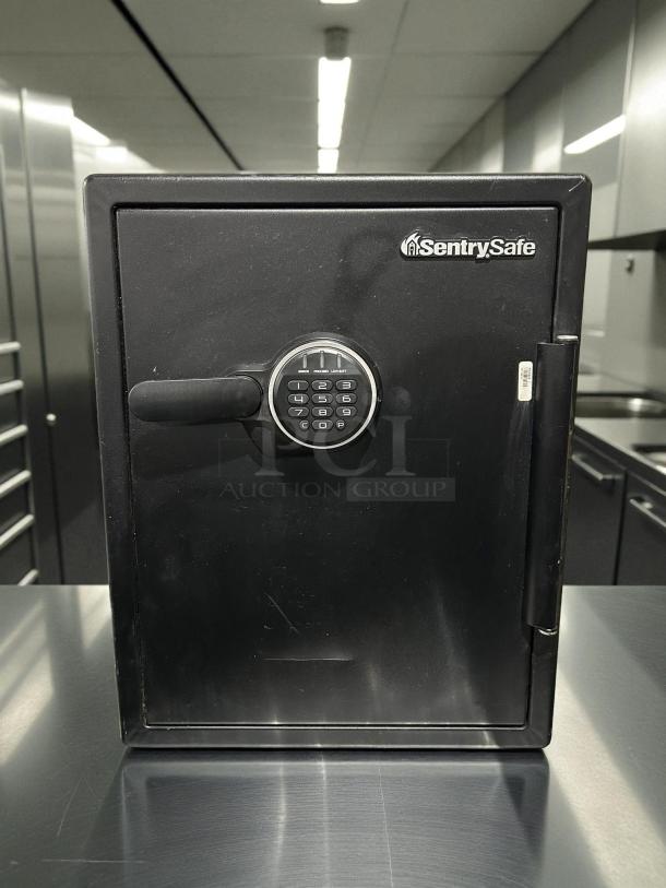 Sentry Safe Fire-Safe, 1.23 cu ft capacity, digital keypad, black, great condition, tested and working.