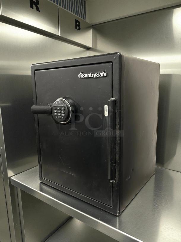 Sentry® Safe Fire-Safe, 1.23 cu ft, black, digital keypad, great condition, tested and working.