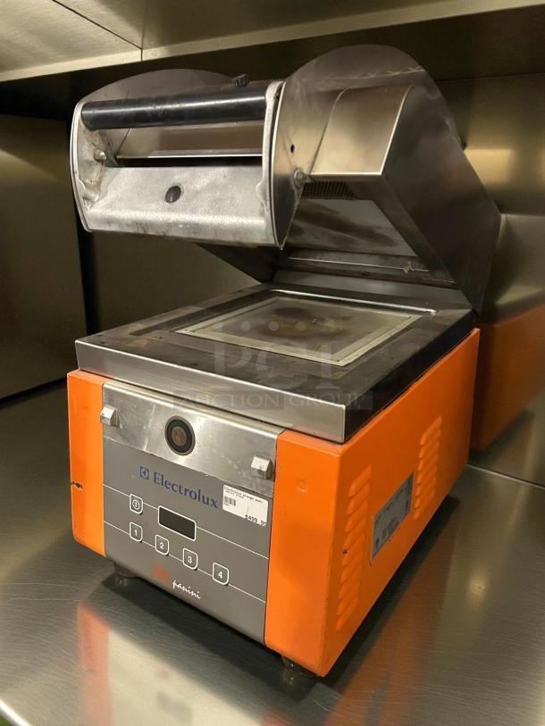Electrolux HSPPME Panini Grill; orange casing, infrared technology, tested, working condition, professional-grade.