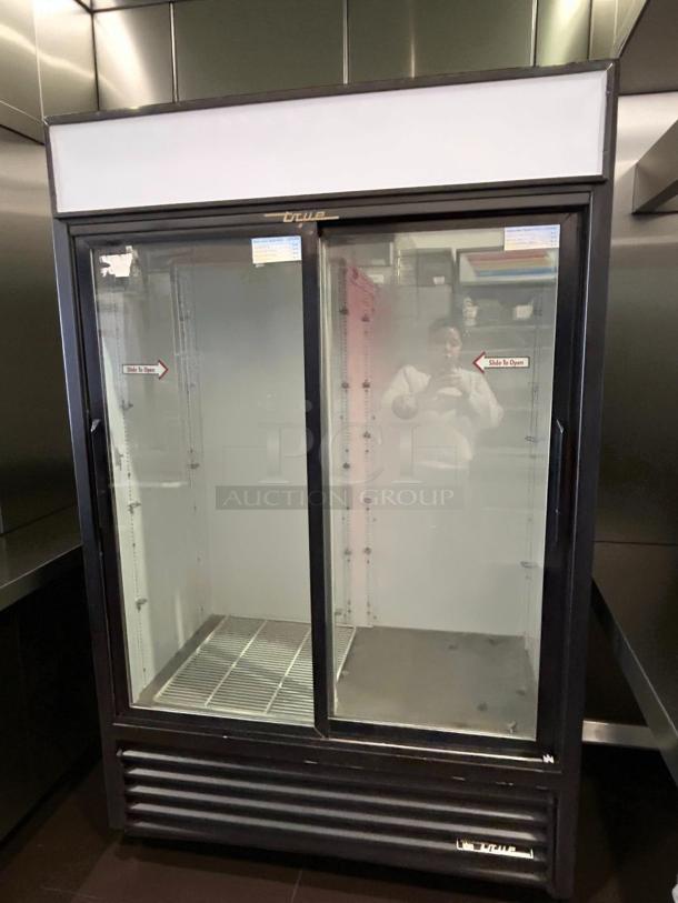 True GDM-45-HC-LD merchandiser with two sliding glass doors, black finish, 51 1/8", tested and working, excellent condition.