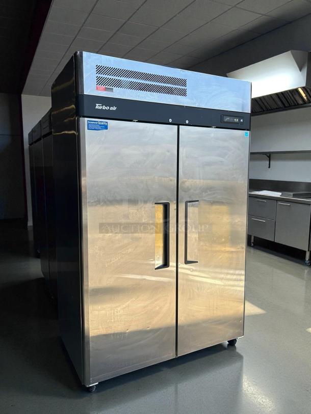 Turbo Air M3F47-2-N Reach-In Freezer, excellent condition, stainless steel, 2 doors, tested and working, model label visible.
