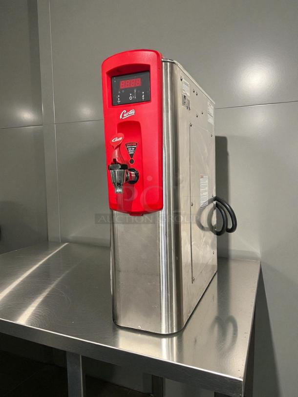 Curtis WB5N G3 5 Gallon Hot Water Dispenser, excellent condition, red and stainless steel, tested and working.