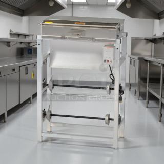Hobart W32-6 hand wrap station, 3 roll film capacity, 120v, stainless steel, tested and working, in clean kitchen setting.