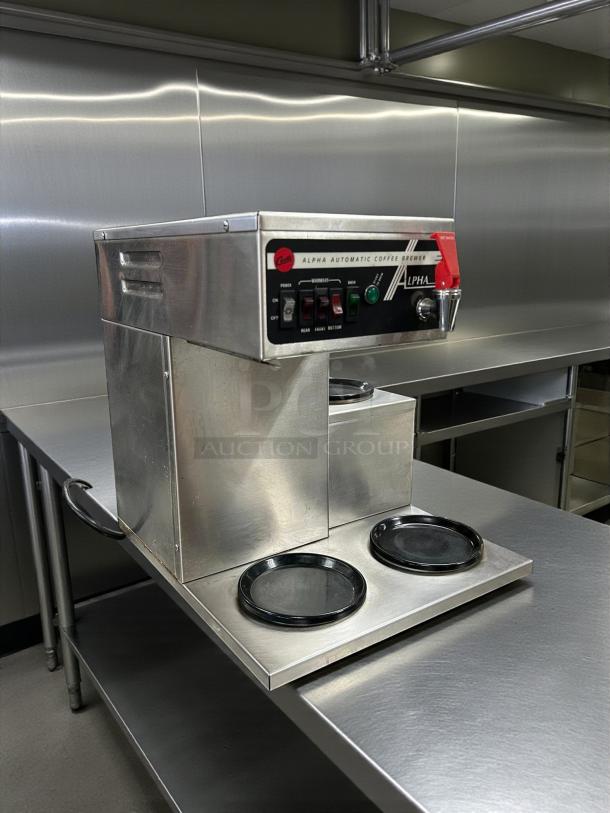 Curtis ALP3GTR12A000 12 Cup Coffee Brewer, 3 lower warmers, stainless steel, tested working, 120V, excellent condition.