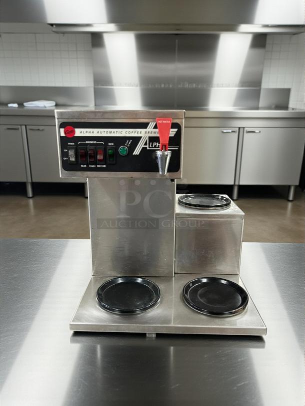 Curtis ALP3GTR12A000 12 Cup Coffee Brewer, 3 lower right warmers, stainless steel, tested and working.