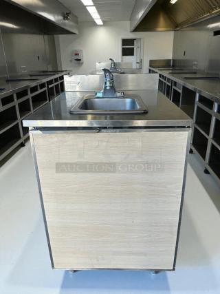 Duke SUB-PS-24-CM hand sink cabinet, stainless steel, 24", excellent condition, tested and working, visible side panel.