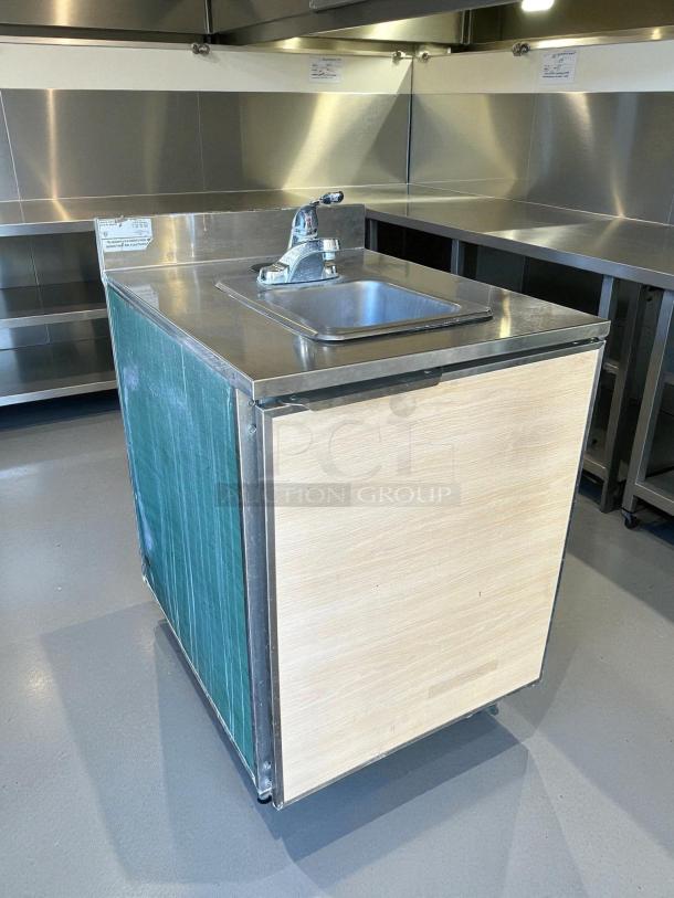 Duke UB-PS-24-CM hand sink cabinet in great condition, stainless steel, 24-inch, tested and working, visible label.