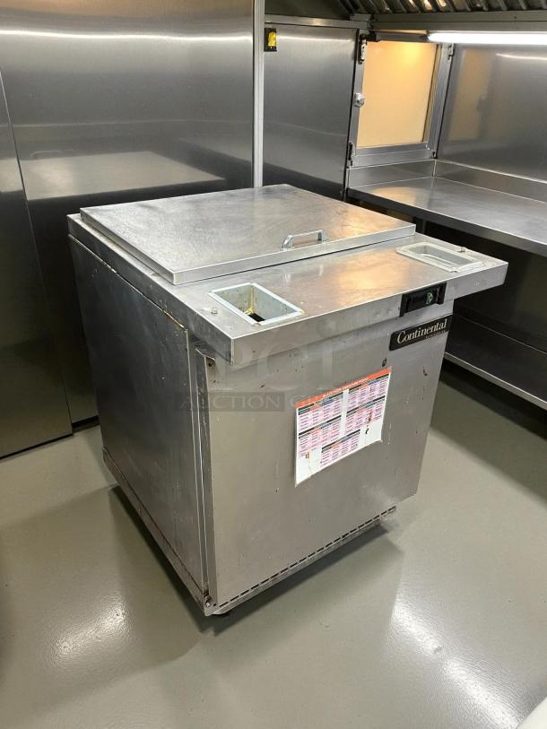 Continental SW27-8 Refrigerated Sandwich Prep Unit, 27" 7.4 cu ft, tested, working, stainless steel, visible label on front.