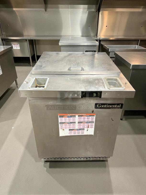 Continental SW27-8 refrigerated sandwich prep unit, 27", 7.4 cu ft, tested working, visible menu sticker, good condition.
